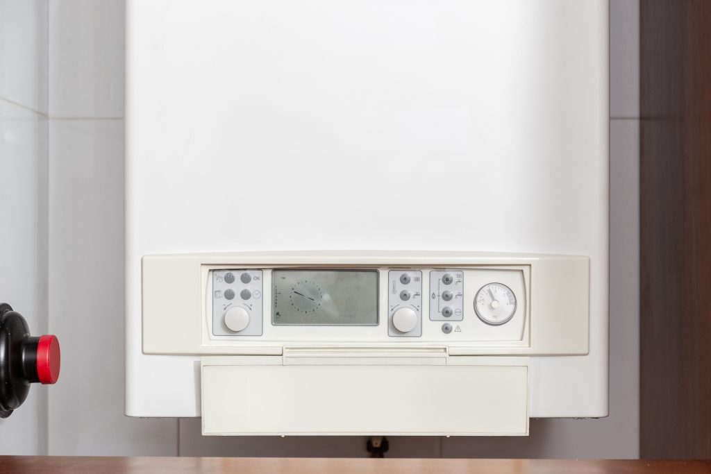 gas water heater controlling panel or gas boiler in home indoor